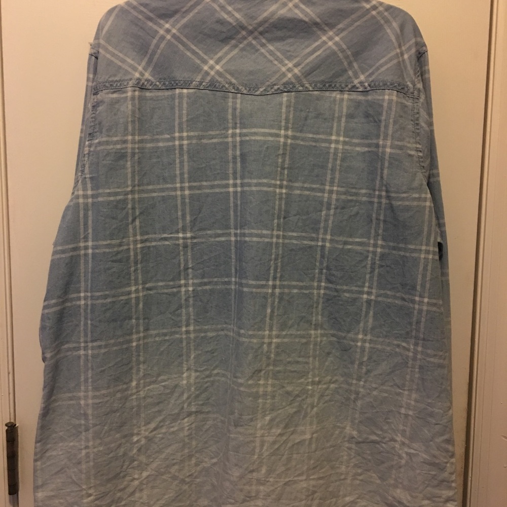 Blue plaid long sleeve button down the front shirt